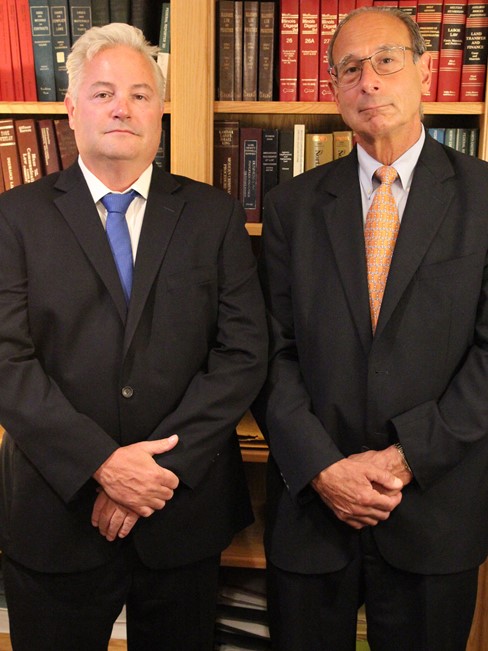 Christopher E. Bemben and Earl B. Grinbarg
